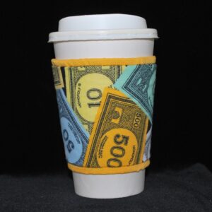 Monopoly money on black