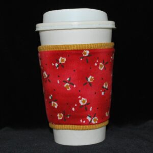 Small gold tulips with 3 green leaves on red